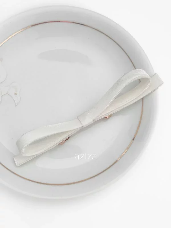 laço minimalista branco